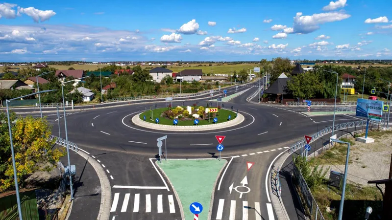 Noul sens giratoriu de pe DN7 din Buftea, la intersecția cu strada Milano, văzut de sus